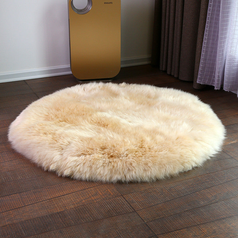 Okrągły dywanik ze sztucznego futra